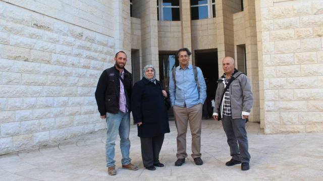 Feryal Abu Haikel, accompanied by a member of Christian Peacemaker Teams, Palestine (left) and two members of of the Israeli Archeology Group Emek Shaveh, who have been advocating for the Abu Haikels